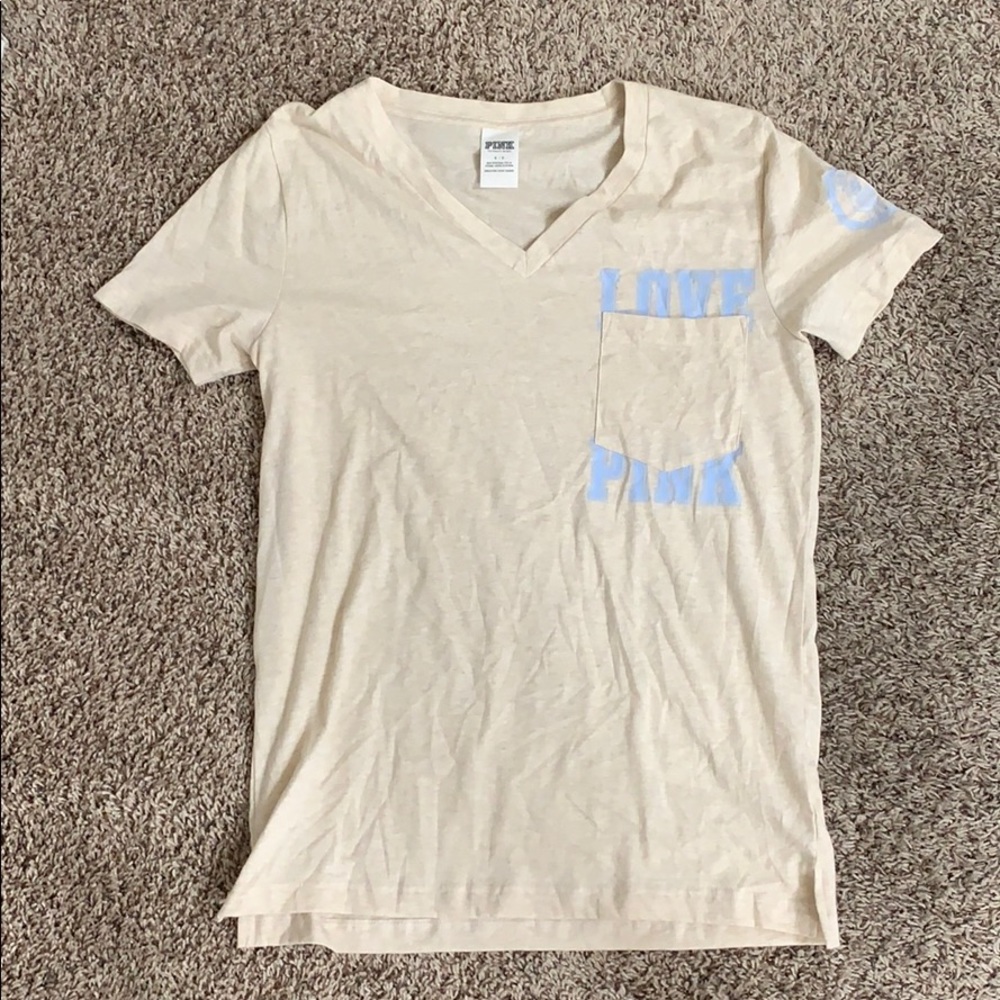 tan and baby blue t-shirt